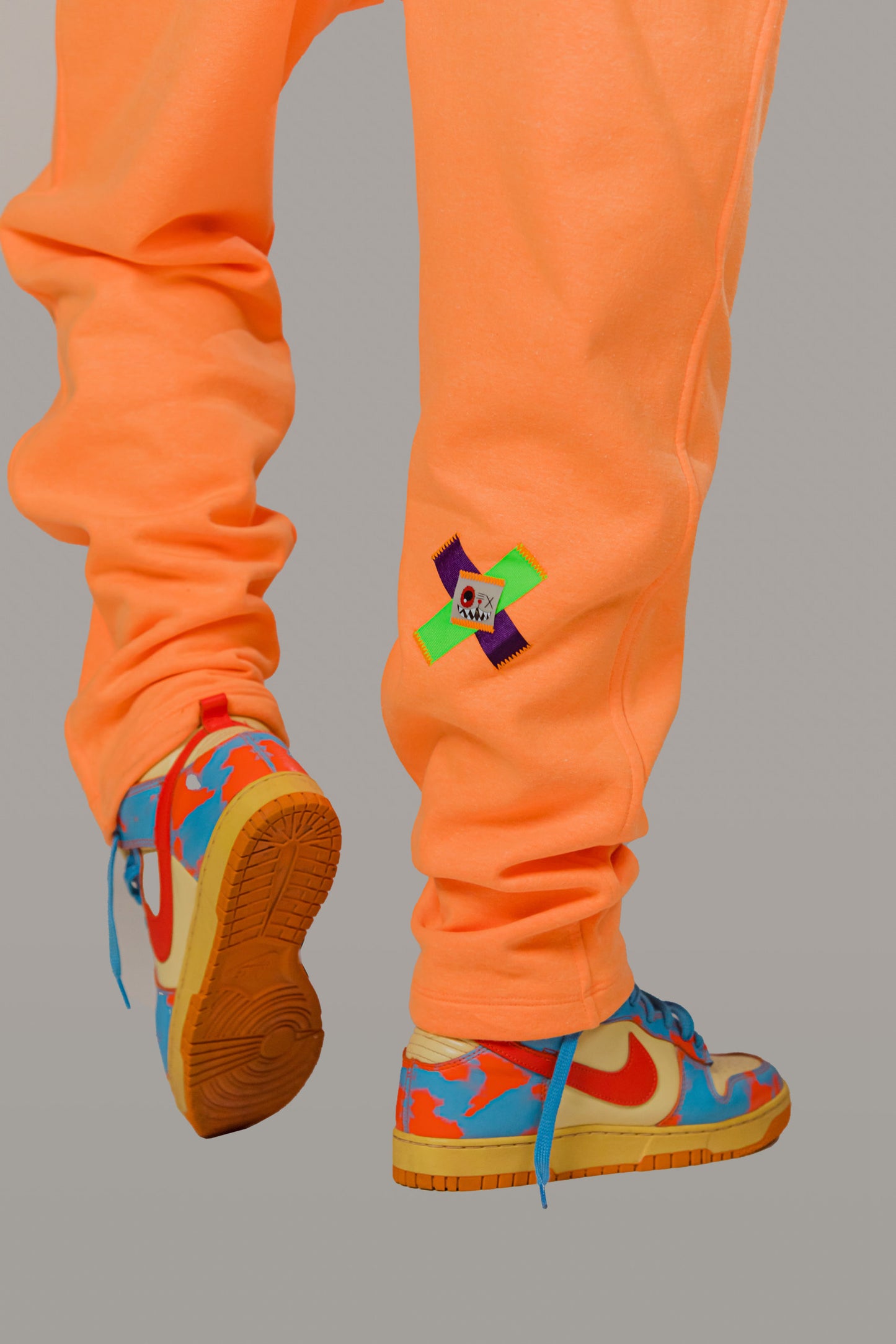 NEON ORANGE SWEATPANTS!