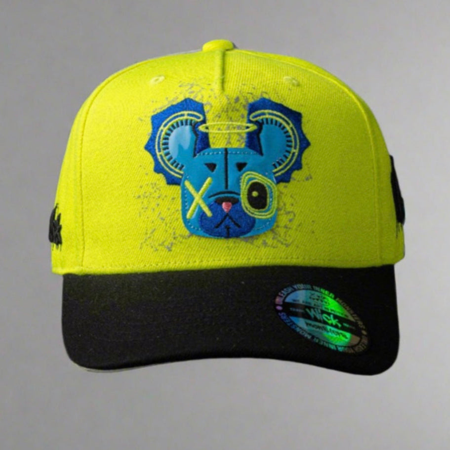 Yellow and black cap with blue graphic design on a gray background
