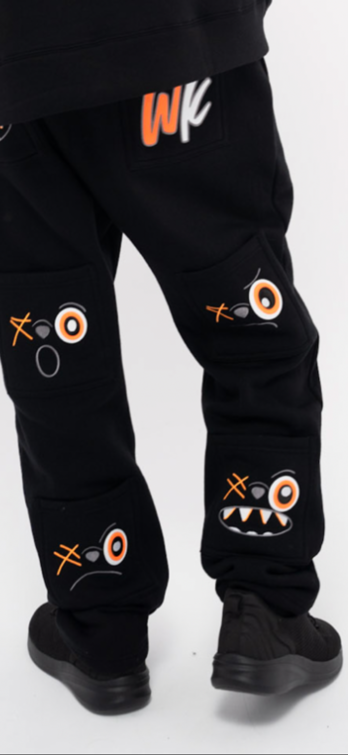 ORANGE AND BLACK PANTS