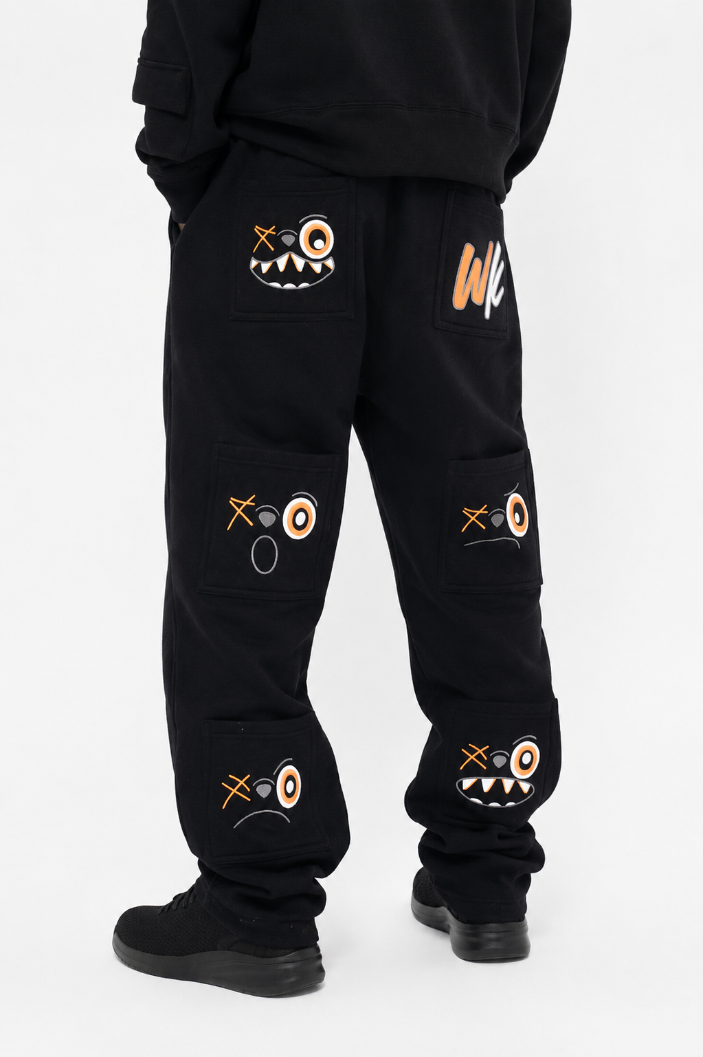 ORANGE AND BLACK PANTS