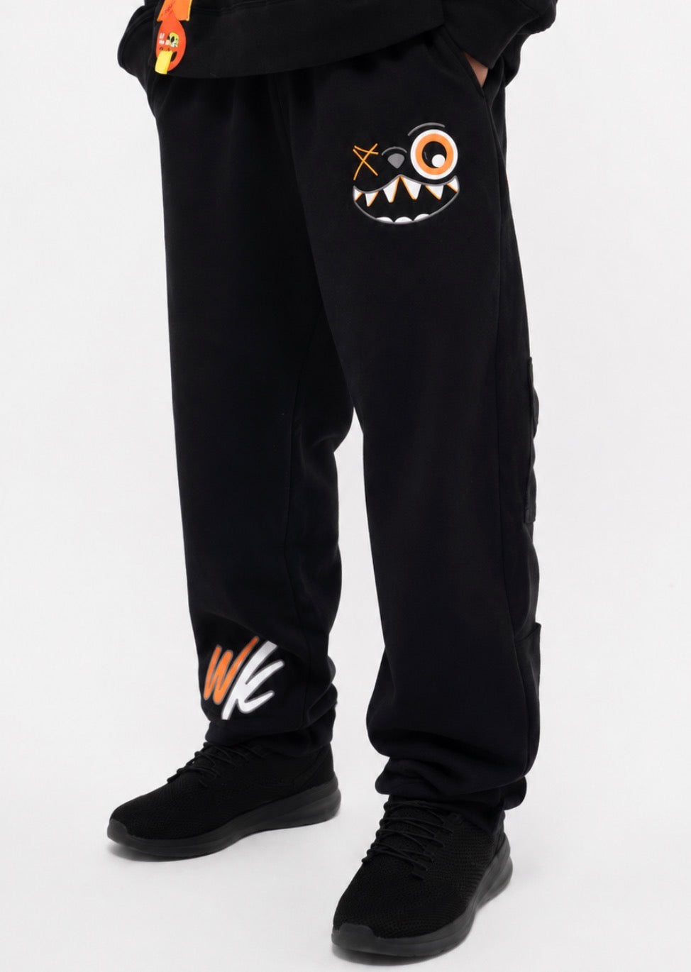 ORANGE AND BLACK PANTS