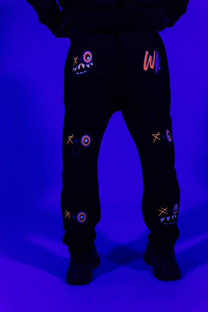 ORANGE AND BLACK PANTS
