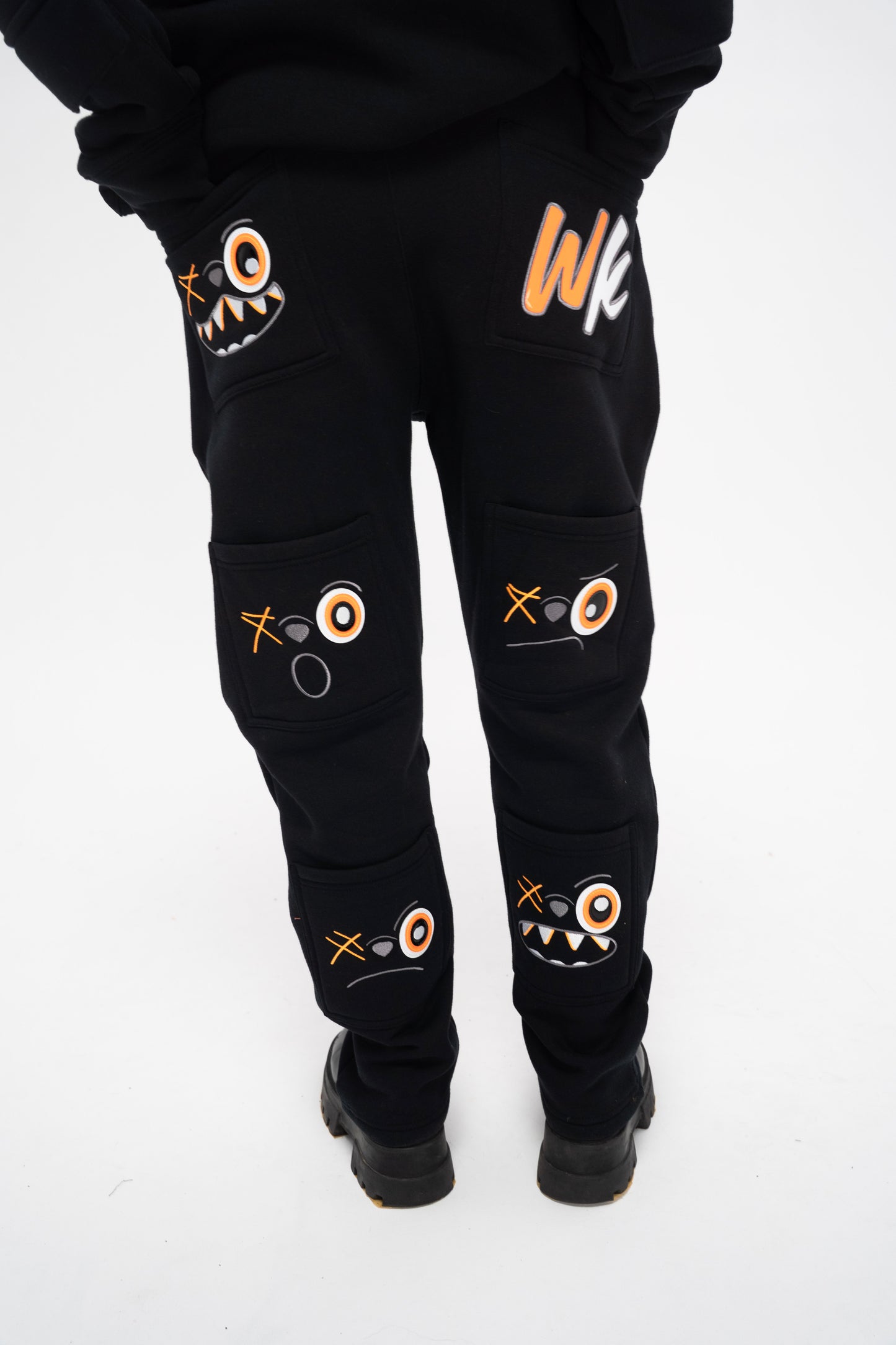 ORANGE AND BLACK PANTS