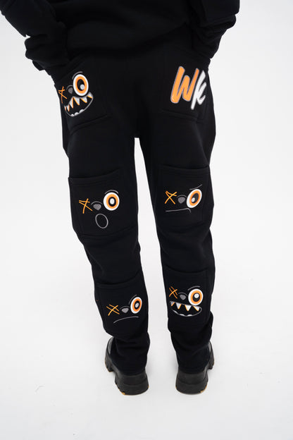 ORANGE AND BLACK PANTS