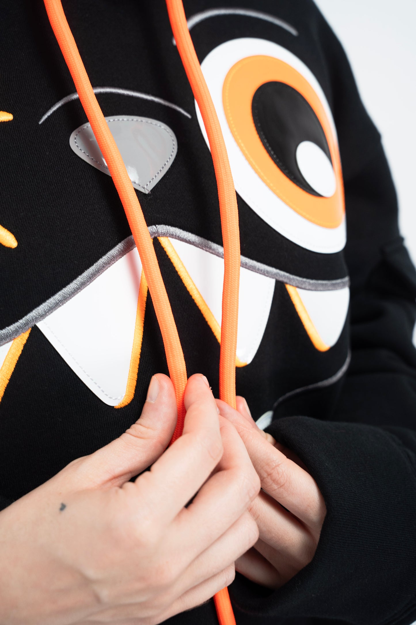 ORANGE AND BLACK HOODIE