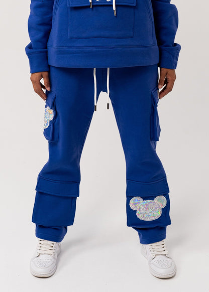 Blue tracksuit with floral designs on a white background
